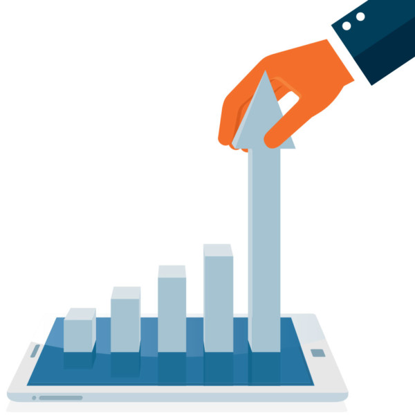 Image of a bar graph rising out of a tablet, with a hand pulling one bar up.