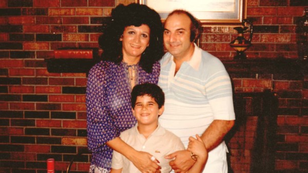 Image of a young Marcus Lemonis with his parents.