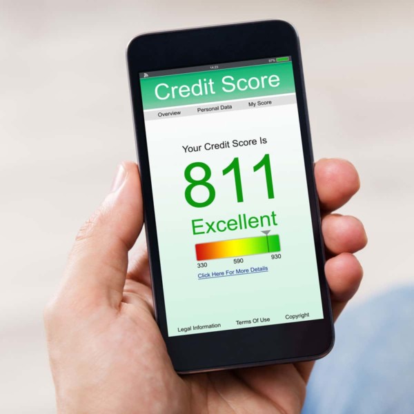 Image of phone with a credit score app on screen.