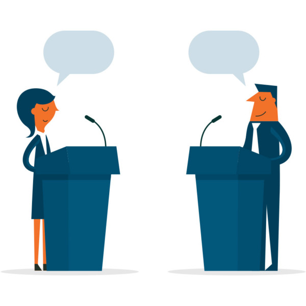 Image of two people standing at podiums having a debate.