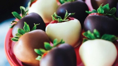 Close-up of eight chocolate covered strawberries