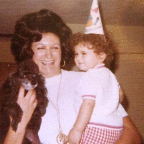 Image of Marcus Lemonis as a child with his mother.
