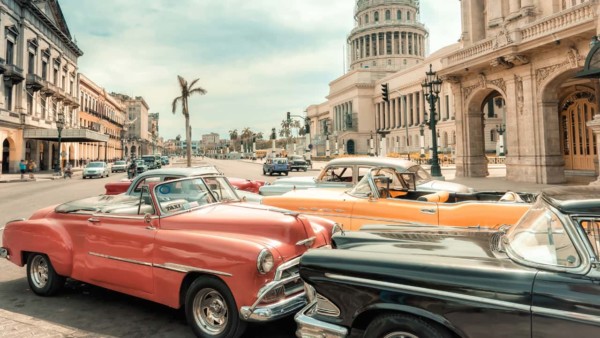 Image of cars on a road in Cuba.