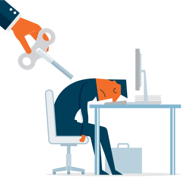 Image of someone going to wind up a worker asleep at a desktop.