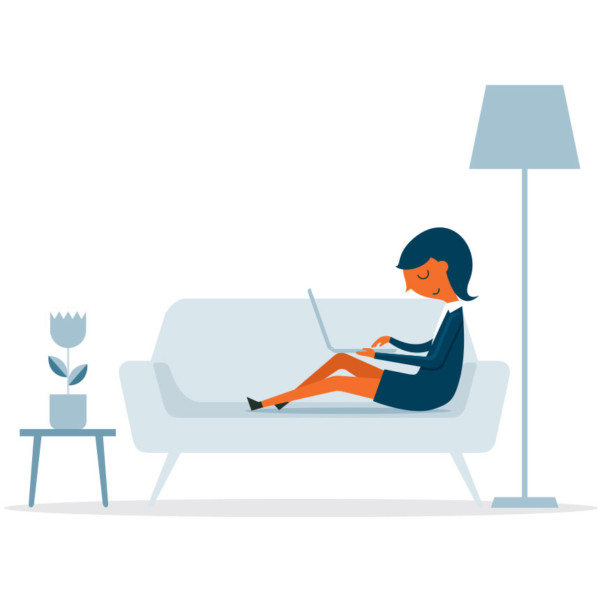Image of someone working on their laptop on the couch