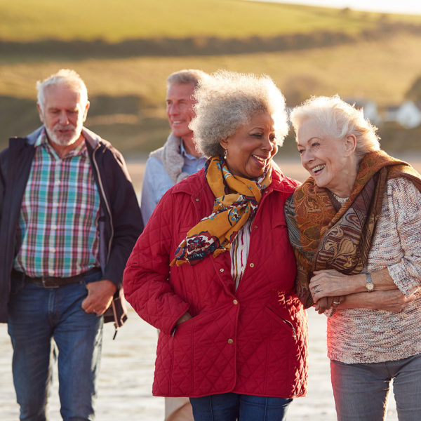 Image of a group of elderly friends together outside
