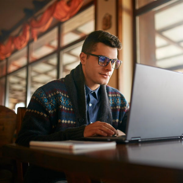 Man working from home in fashionable sweater