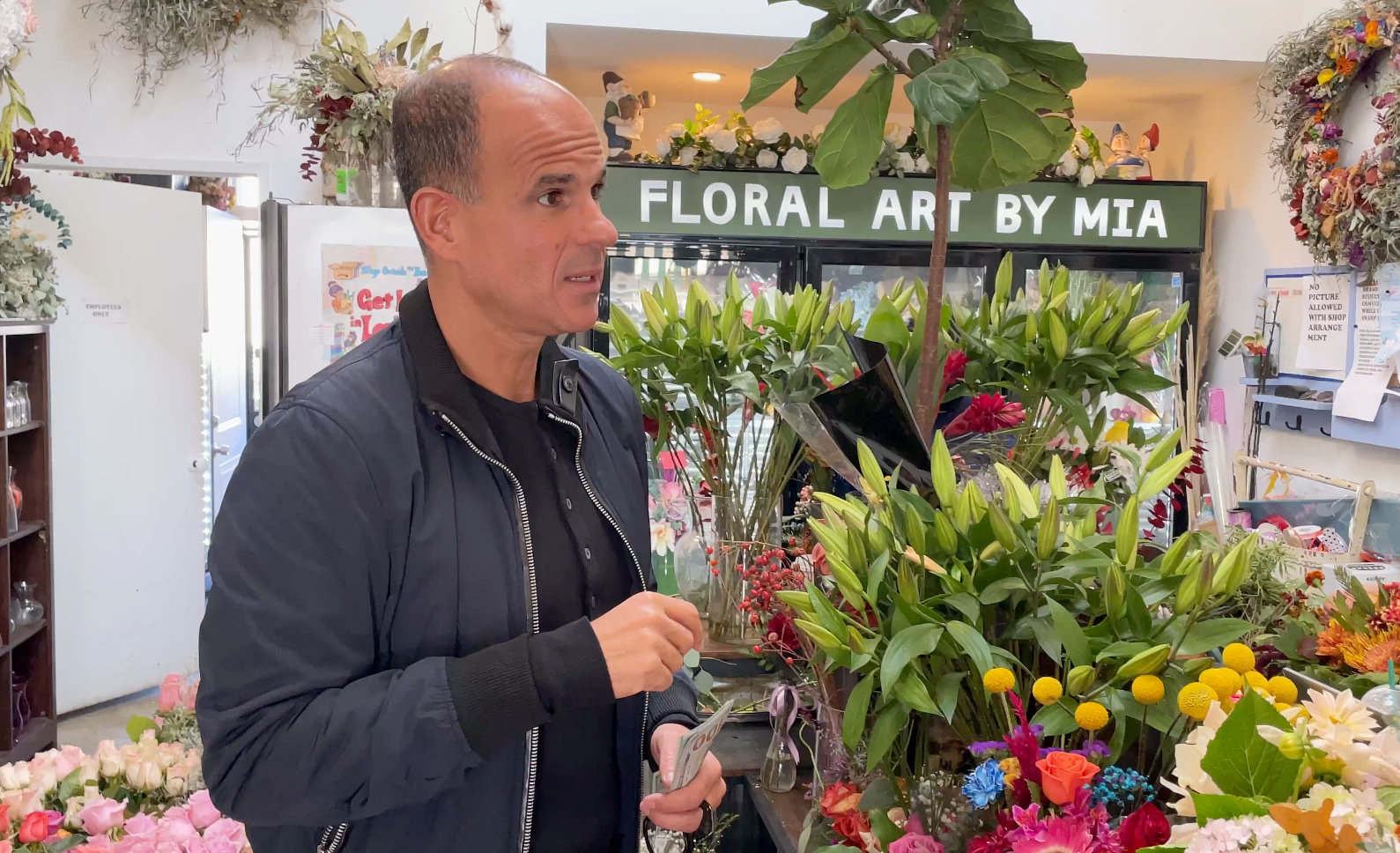 Marcus Lemonis, The Fixer, speaking to owner of floral shop business